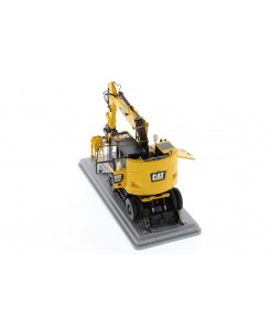 DM85661 - Caterpillar M323F escavatore gommato ferroviario - Safety yellow /1:50 Diecast Masters