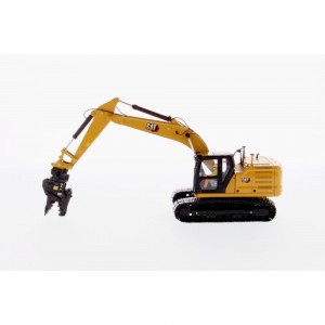 DM85657 - Caterpillar 323 (next gen) excavator with 4 work tools /1:50 Diecast Masters